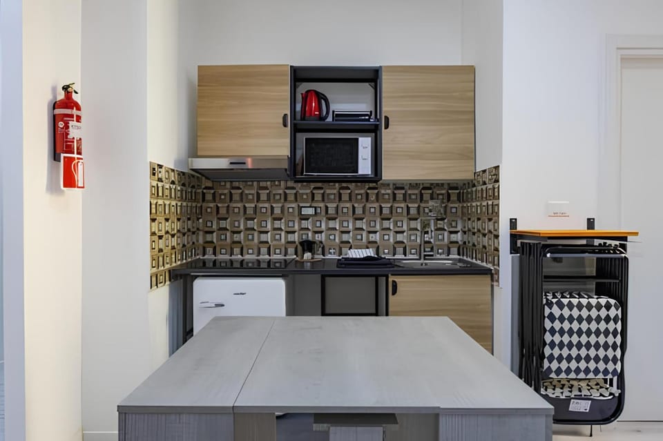 Kitchen or kitchenette, stove, toaster