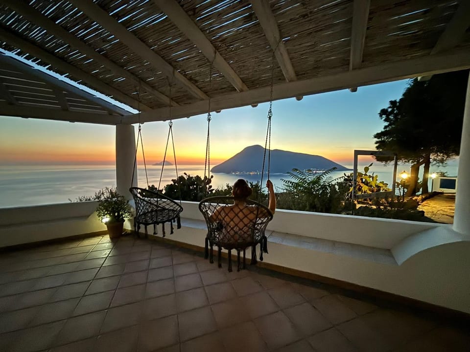 Patio, Natural landscape, Balcony/Terrace, Dining area, Sea view, Sunset