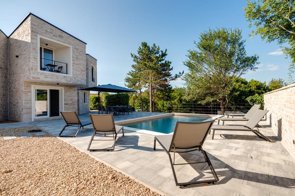 Modern villa with heated pool, whirpool in quiet area - by Traveler tourist agency Krk ID 2180 Villa in Primorje-Gorski Kotar County
