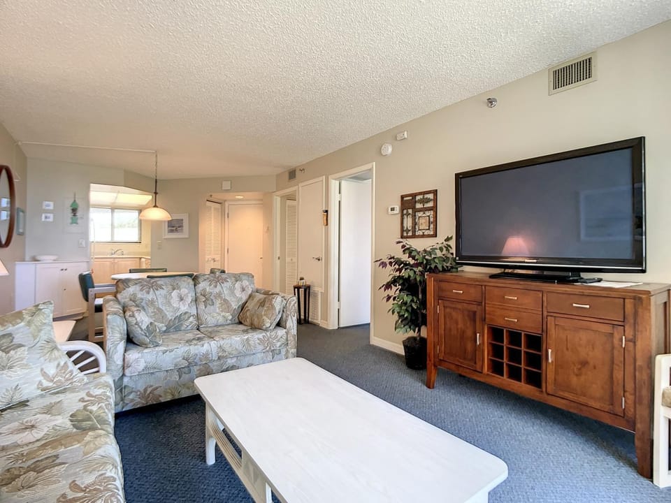 Beachfront with a pool at Ocean Trillium Condo ~ 101 Apartment in New Smyrna Beach