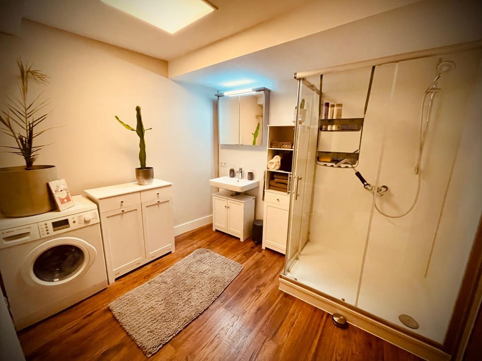 Shower, towels, washing machine, dryer