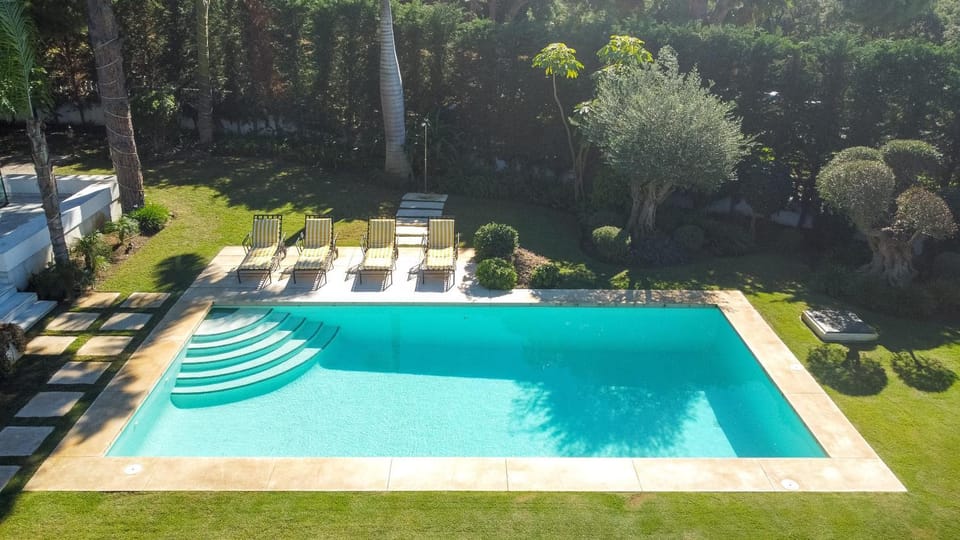 Property building, Living room, Swimming pool