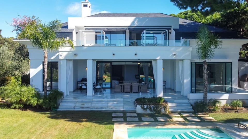 Property building, Living room, Swimming pool