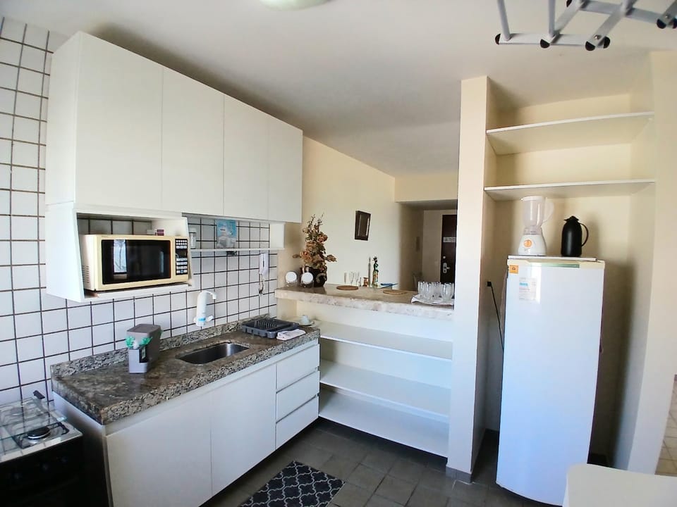 Kitchen or kitchenette, oven, stove