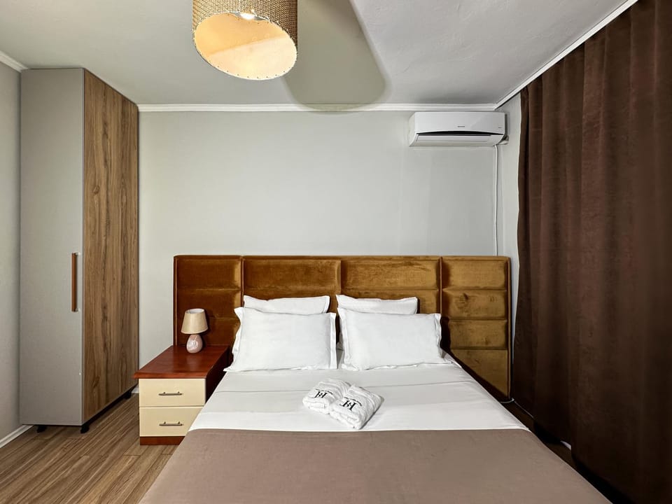 Bed, Photo of the whole room, towels, wardrobe, air conditioner
