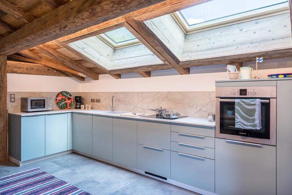 Kitchen or kitchenette, dishwasher, oven, stove