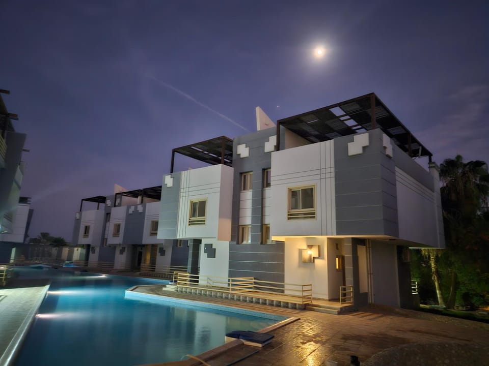 Property building, Night, Swimming pool