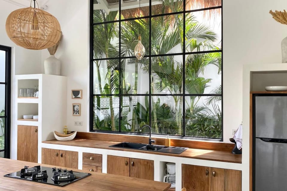 Kitchen or kitchenette, dishwasher, oven, stove