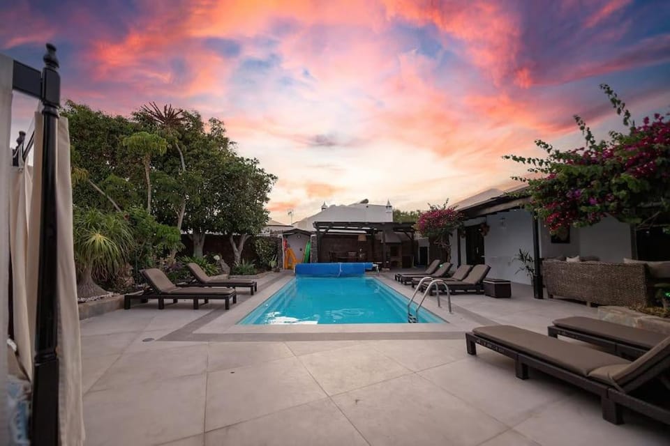 Patio, Pool view, Swimming pool, Sunset, sunbed