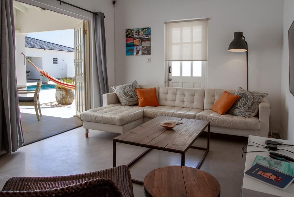 TV and multimedia, View (from property/room), Living room, Seating area, Garden view, Pool view