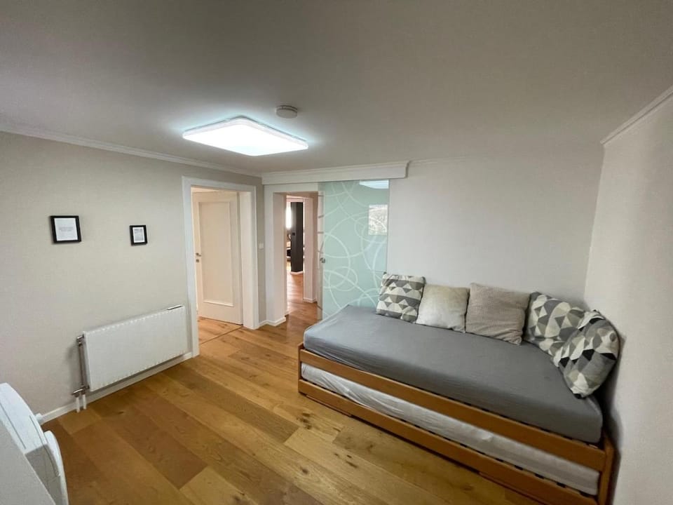 Bed, Seating area, Bedroom