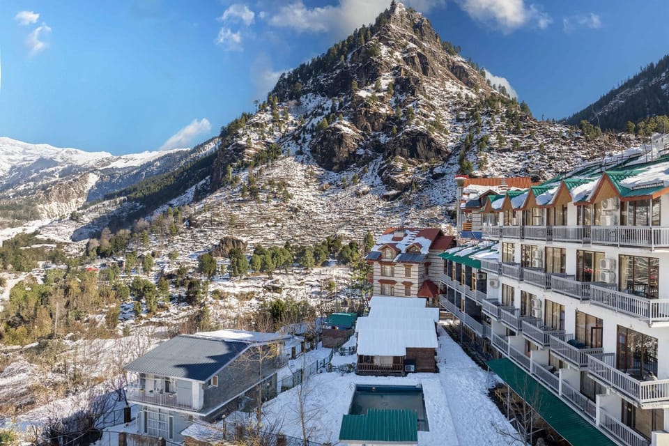 Property building, Natural landscape, Bird's eye view, Winter, Mountain view, Swimming pool