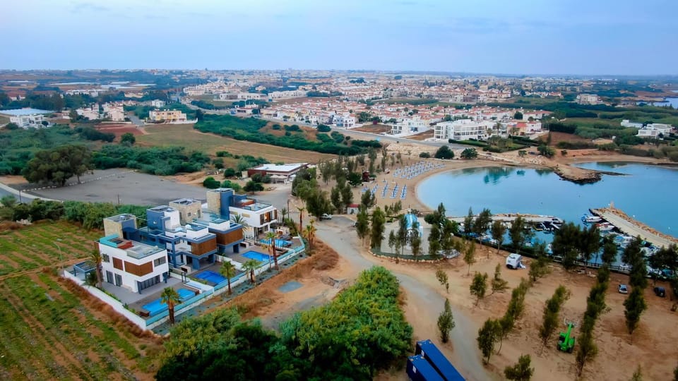 Property building, Natural landscape, Bird's eye view, Beach, Location