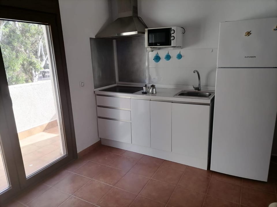 Kitchen or kitchenette, stove