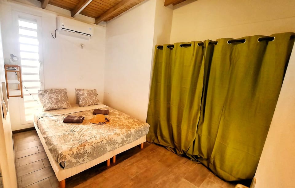 Bed, Photo of the whole room, Bedroom, towels, air conditioner