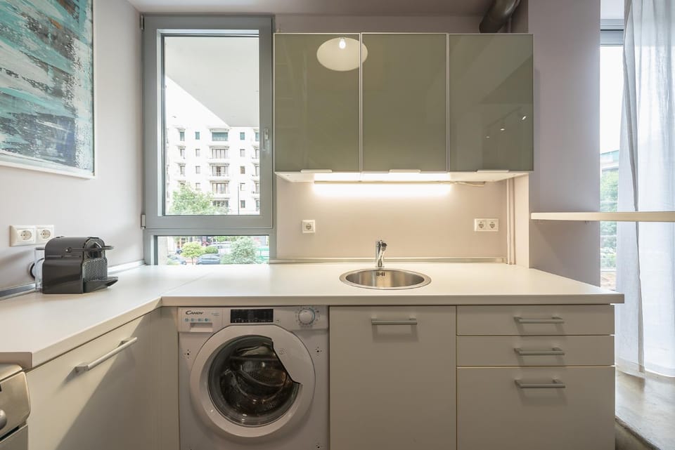 Kitchen or kitchenette, washing machine