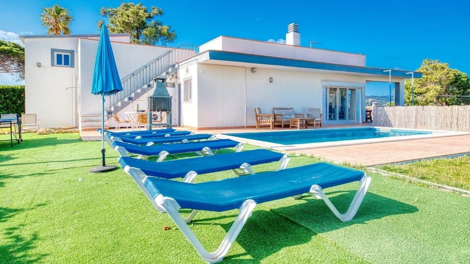 Property building, Living room, Swimming pool