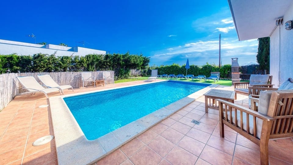 Property building, Living room, Swimming pool