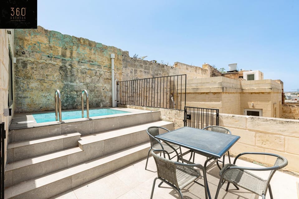 Property building, Patio, Day, View (from property/room), Balcony/Terrace, Living room, Seating area, Dining area, Pool view, Swimming pool, sunbed