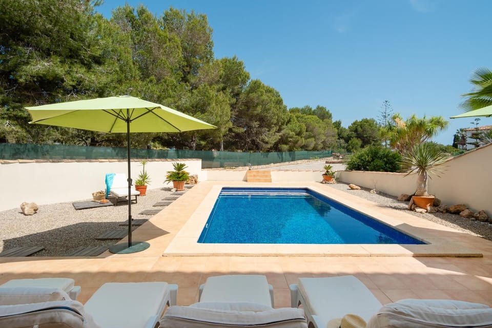 Property building, Living room, Swimming pool