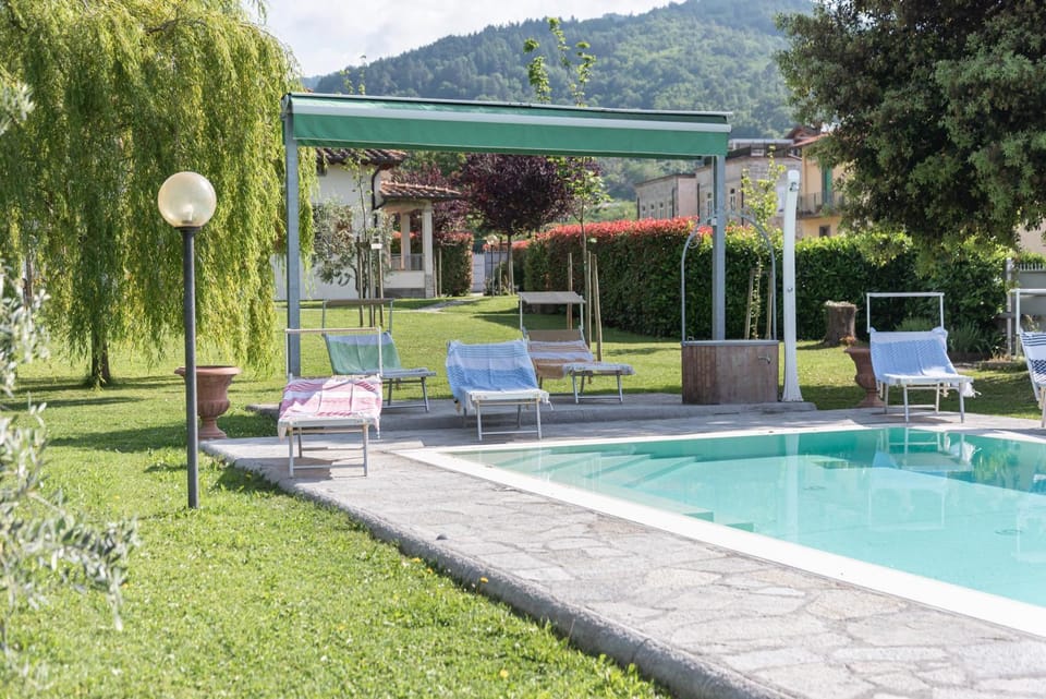 Property building, Living room, Swimming pool