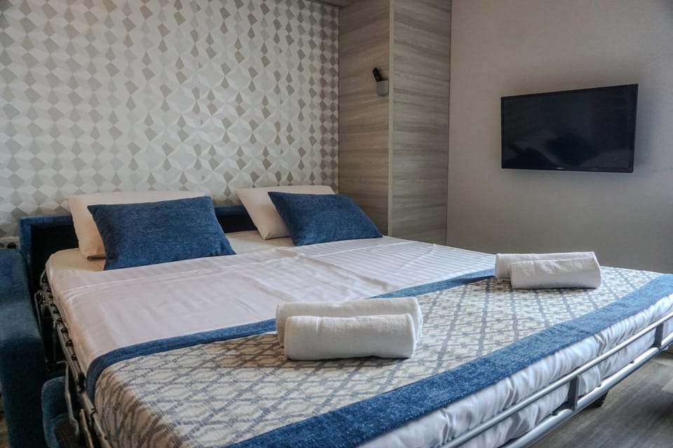 Bed, TV and multimedia