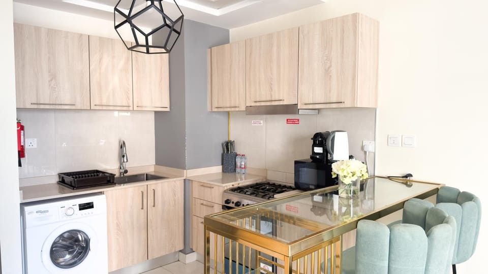 Kitchen or kitchenette, Dining area, oven, stove, washing machine