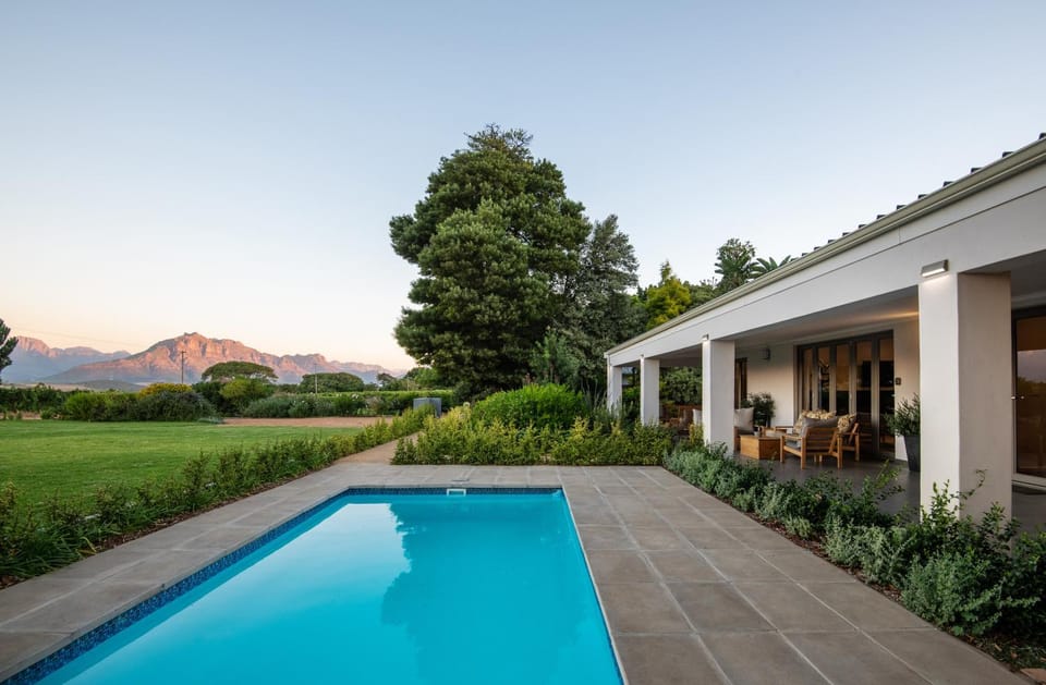 Property building, Patio, Natural landscape, Garden, Garden view, Mountain view, Pool view, Swimming pool