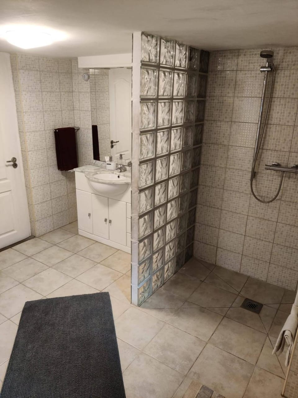 Shower, Toilet, Bathroom, hair dryier, towels
