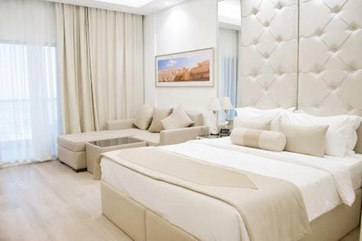 Bed, Seating area, Bedroom