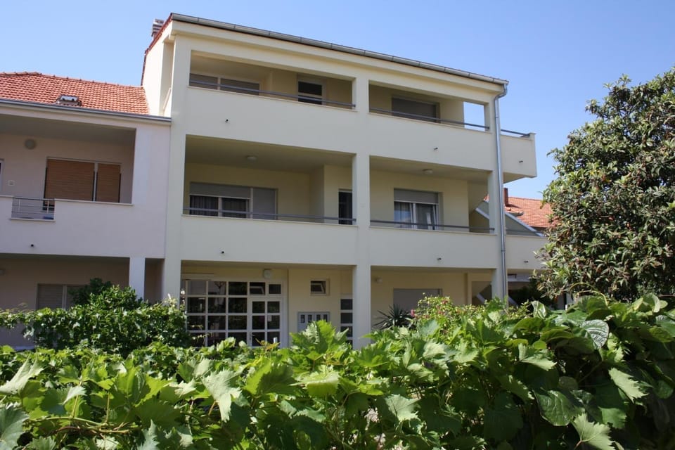 Property building, Facade/entrance, Day, Garden view