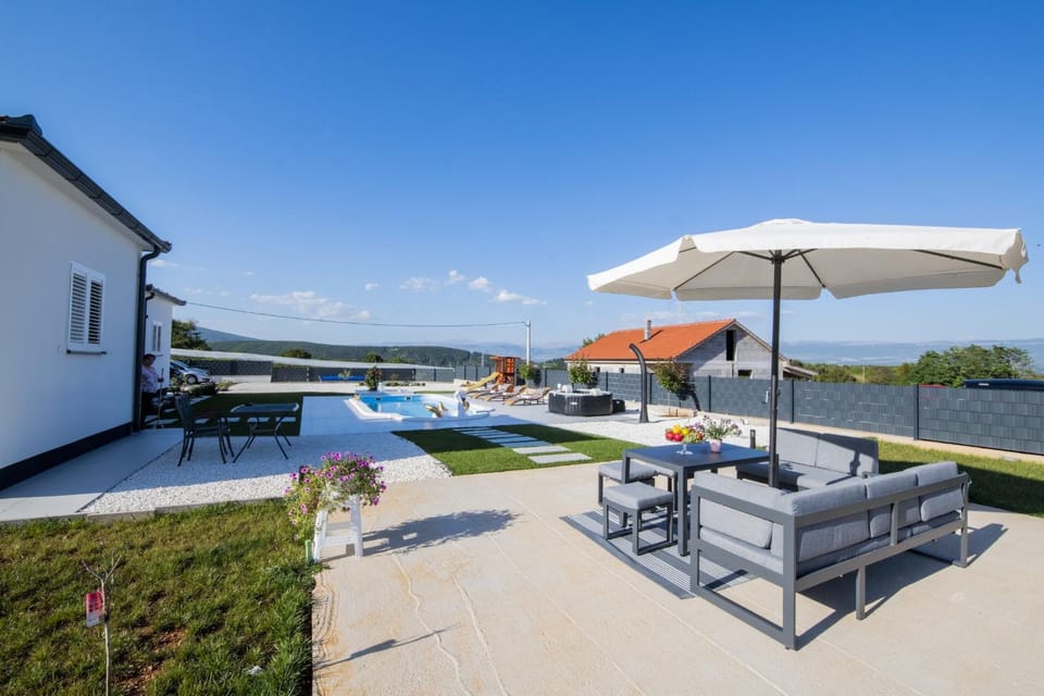 Patio, Dining area, Swimming pool, sunbed