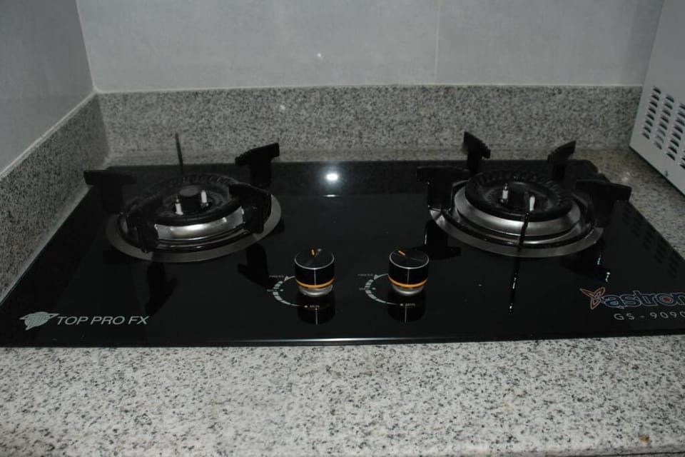 Kitchen or kitchenette, stove