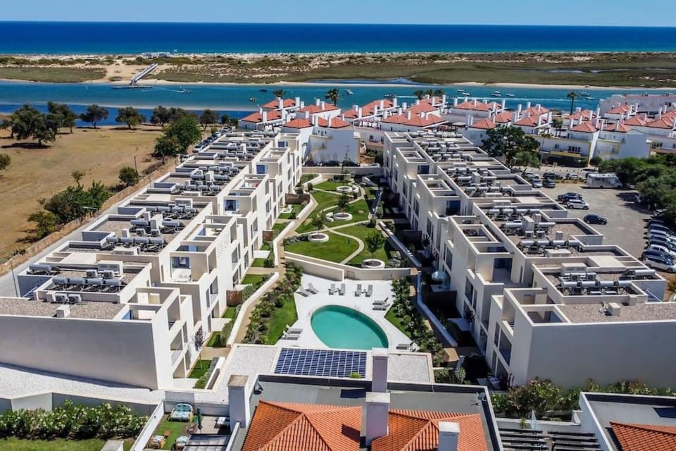 Stylish 2BR Apt w- Pool & Gym, Steps To Ria Formosa Apartment in Cabanas de Tavira
