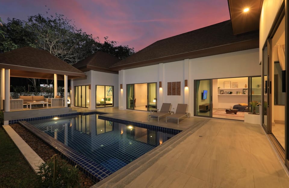 Property building, Patio, Night, Pool view, Swimming pool, sunbed