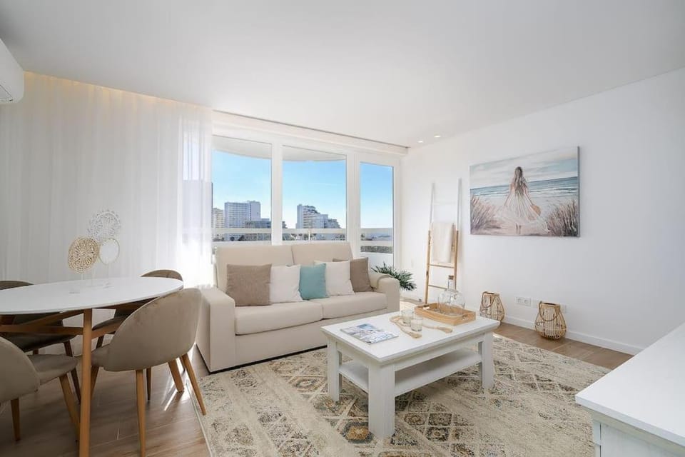 Stylish Beachfront Escape . Steps to Beach . Wifi Apartment in Portimao