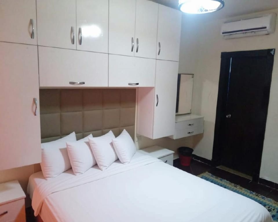 Bed, wardrobe, air conditioner