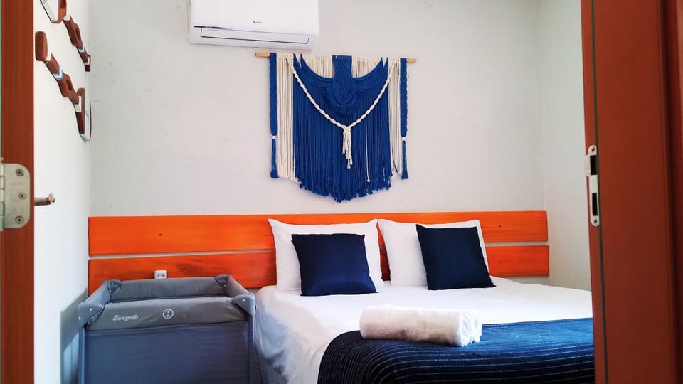 Bed, Bathroom, Photo of the whole room, Bedroom, cot, towels, air conditioner