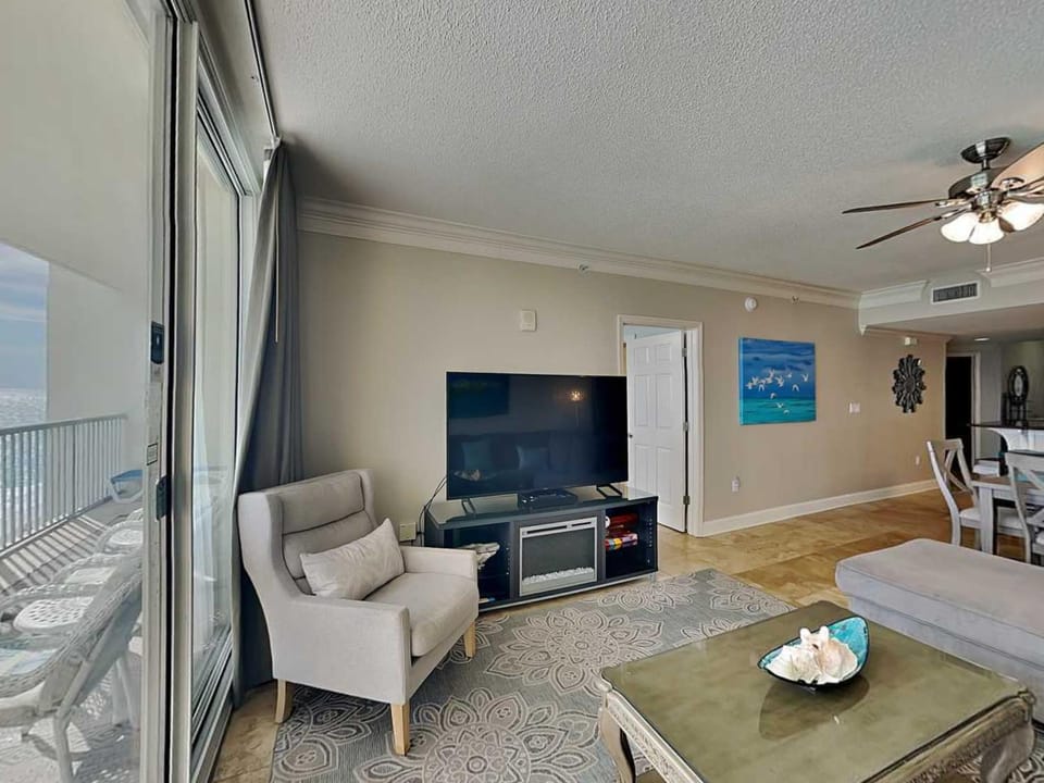 TV and multimedia, Balcony/Terrace, Living room, Seating area, Sea view, fireplace, furniture, air conditioner
