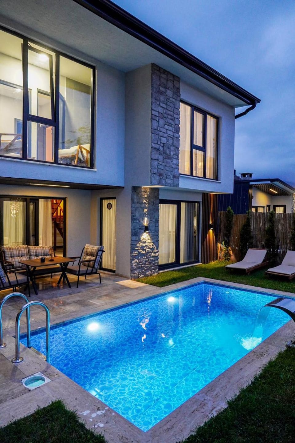 Property building, Patio, Night, Pool view, Swimming pool, Swimming pool