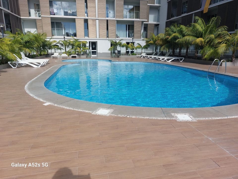 Swimming pool, sunbed