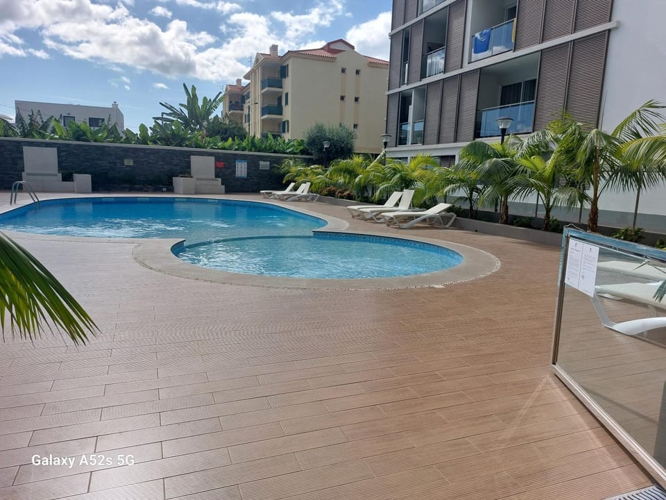 Swimming pool, sunbed