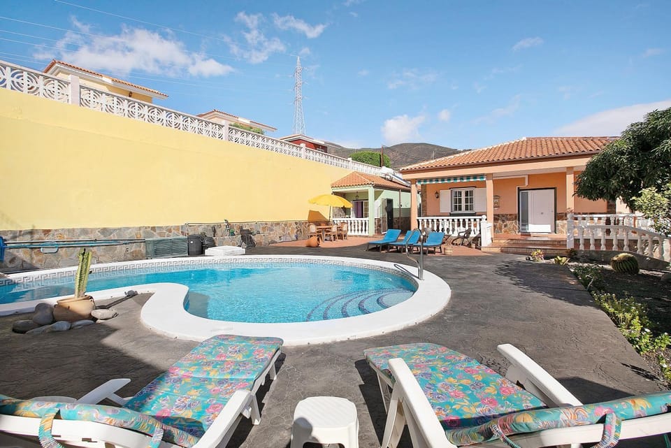 Property building, Living room, Swimming pool