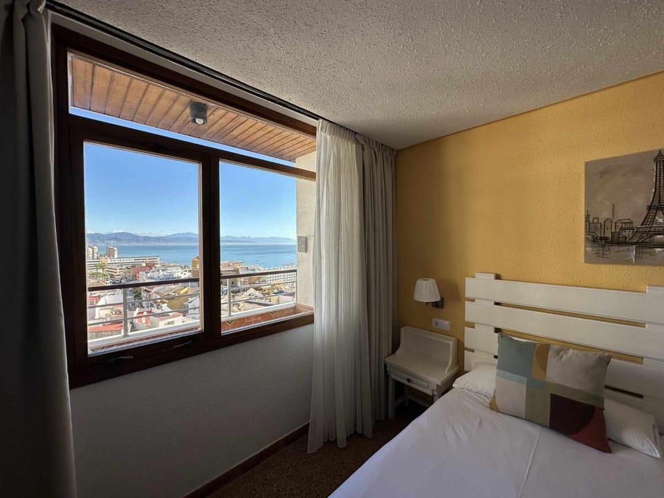 Bed, Bird's eye view, Photo of the whole room, City view, Sea view