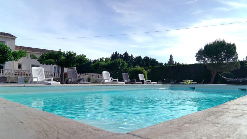 Swimming pool, sunbed