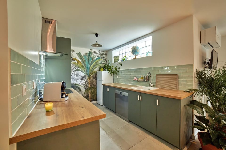 Kitchen or kitchenette, dishwasher, microwave, oven, stove