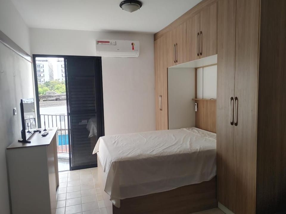 Bed, TV and multimedia, Bedroom, hair dresser, wardrobe, air conditioner