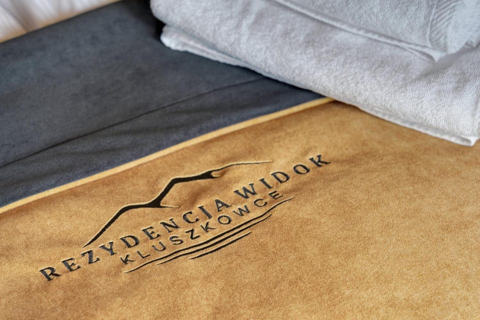 Bed, Property logo or sign, Decorative detail