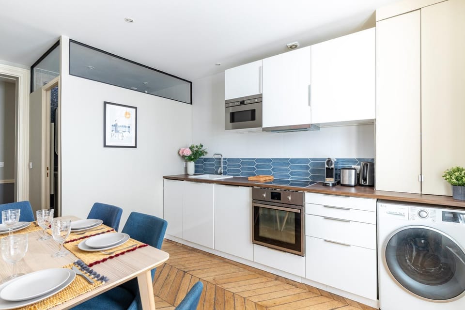 Kitchen or kitchenette, Dining area, dishwasher, oven, stove, toaster, washing machine, dryer