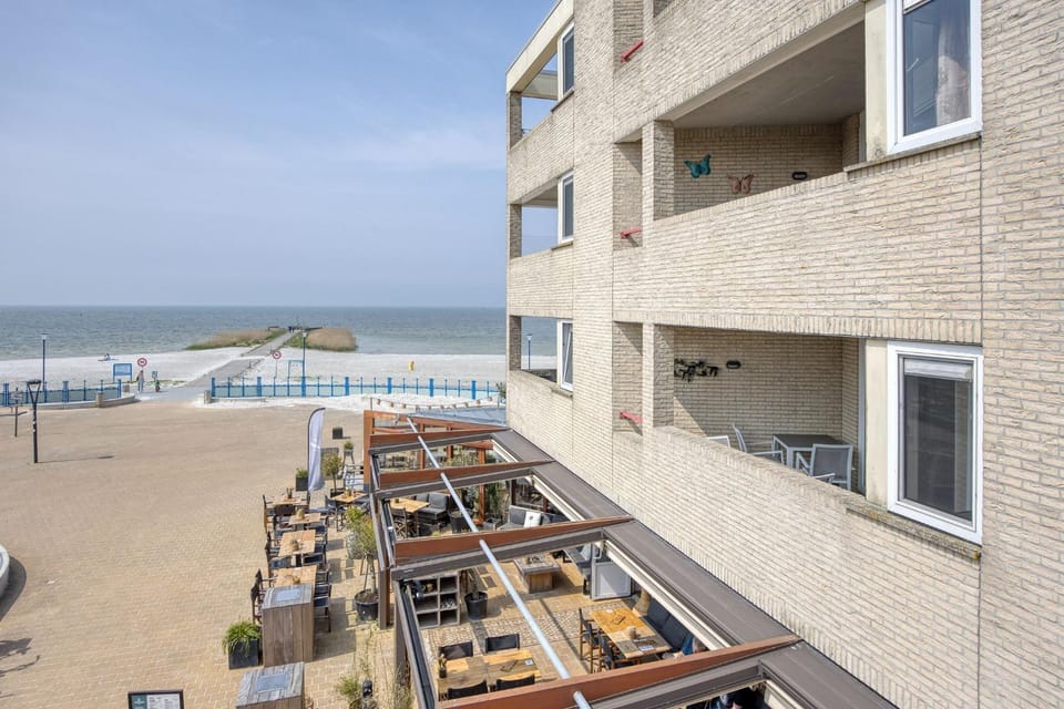 Property building, Day, View (from property/room), Balcony/Terrace, Beach, Sea view